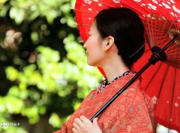 Japonaise en tenue traditionnelle Japonaise en tenue traditionnelle